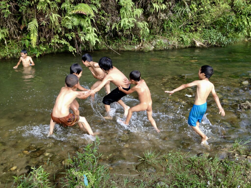 playing in the river